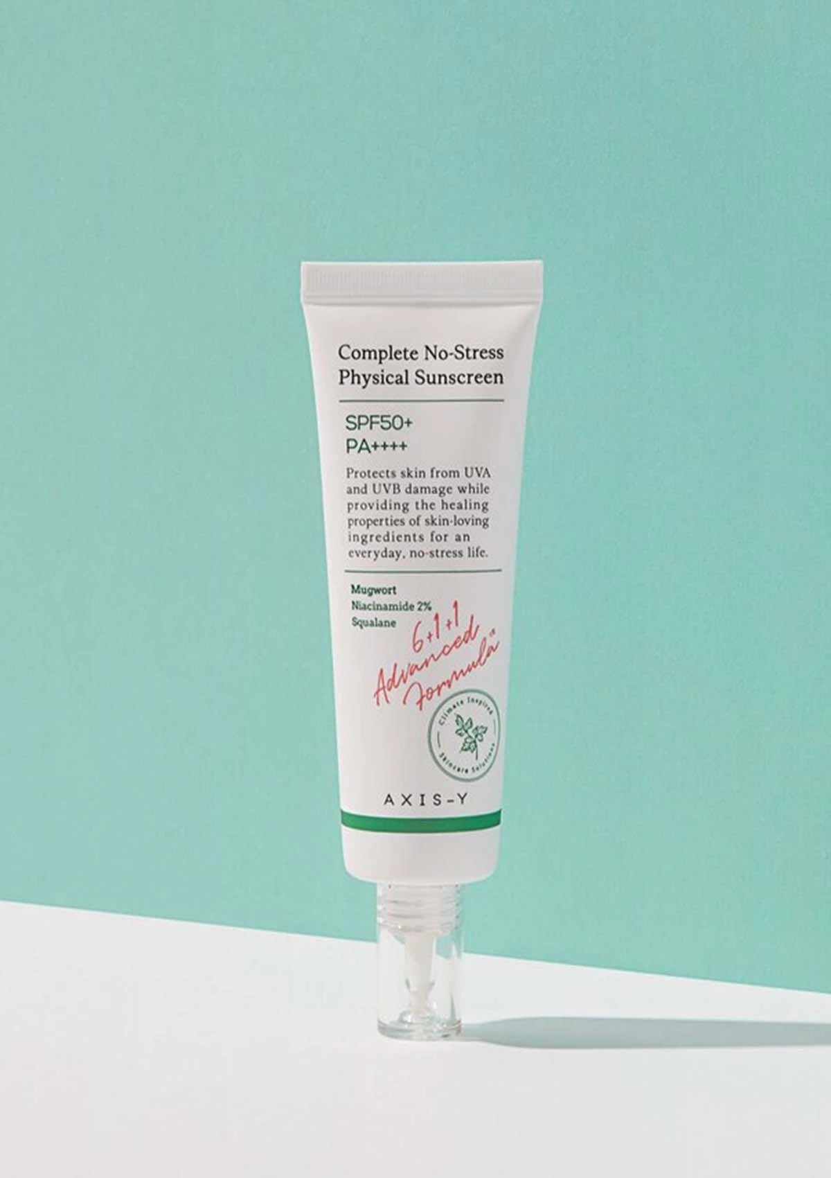 Tube of AXIS-Y Complete No-Stress Physical Sunscreen on a light blue background